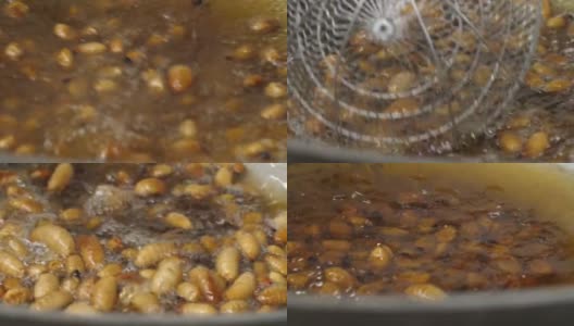 红色的蠕虫棕榈象鼻虫或西米甲虫在平底锅中油炸，西米虫在沸腾的油中油炸的特写高清在线视频素材下载