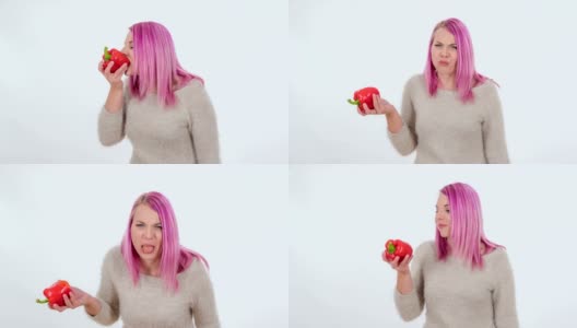 一名年轻女子咬了一口红辣椒，不喜欢它高清在线视频素材下载
