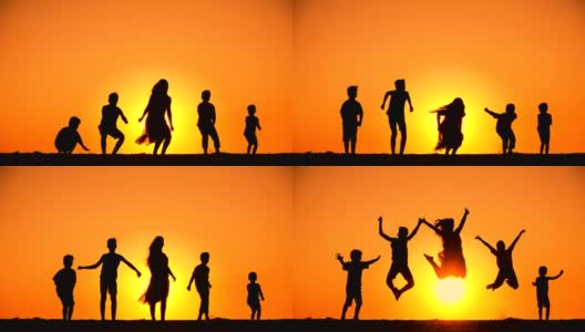 5个孩子在夕阳下跳跃的剪影高清在线视频素材下载
