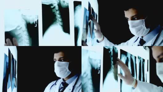 医生双手触摸X光扫描暗室高清在线视频素材下载