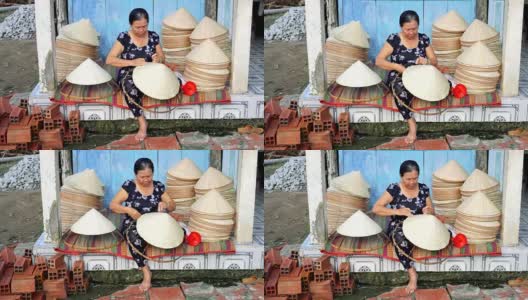 在越南Cantho省的Ap Thoi Phuoc村的老越南工匠制作传统越南帽子的4k视频场景，传统艺术家的概念高清在线视频素材下载