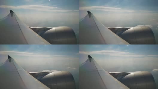 昼光飞行飞机引擎乘客窗口查看全景4k中国高清在线视频素材下载