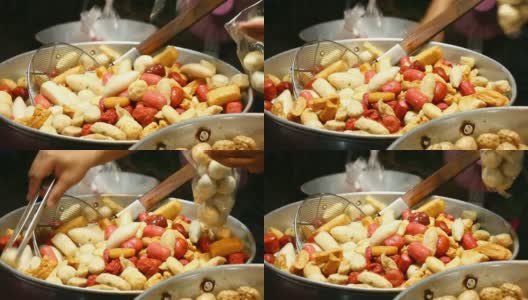 在平底锅里煎肉丸，泰国街头小吃高清在线视频素材下载