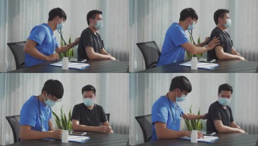 一位亚洲医生正在用听诊器听病人的心跳。高清在线视频素材下载