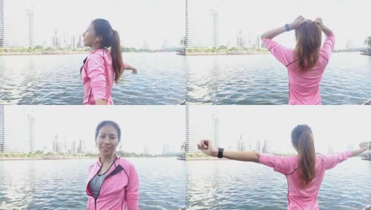 慢动作——穿着健身服的亚洲美女正在用智能手表听音乐，在公园跑步后打电话。有吸引力的健康女性慢跑。高清在线视频素材下载