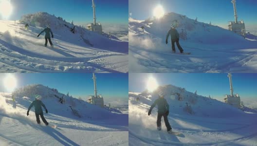慢动作:在有趣的冬日里，山上免费滑雪，新鲜的粉末雪高清在线视频素材下载