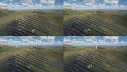 风力涡轮机农场和太阳能电池板的鸟瞰图高清在线视频素材下载