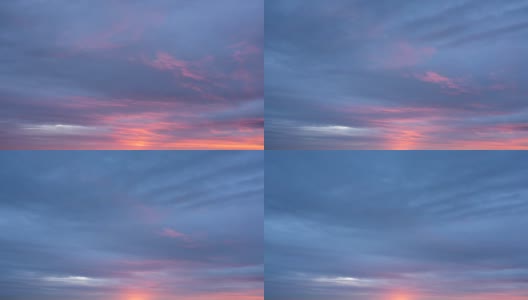 明亮的黎明天空和低云。间隔拍摄无人机视图。高清在线视频素材下载