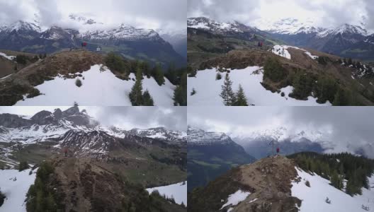空中360视角的山地自行车在山顶高清在线视频素材下载