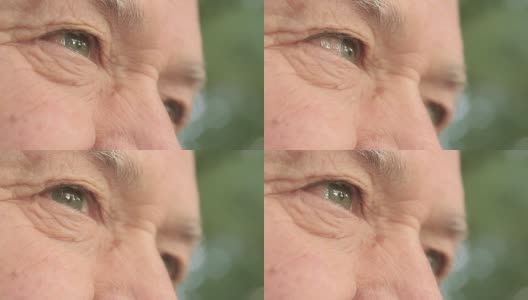 沉思的老人:眼睛上的特写肖像高清在线视频素材下载