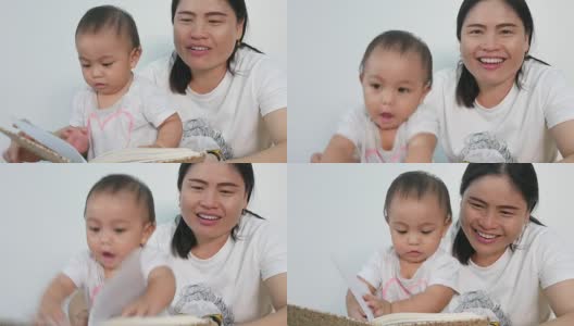 亚洲宝宝和妈妈一起玩和看书高清在线视频素材下载