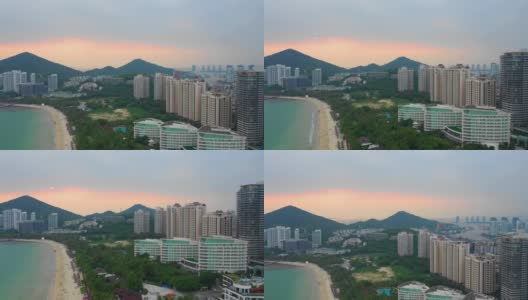 日落天空三亚市风景著名的大东海海滩航拍全景4k中国海南高清在线视频素材下载