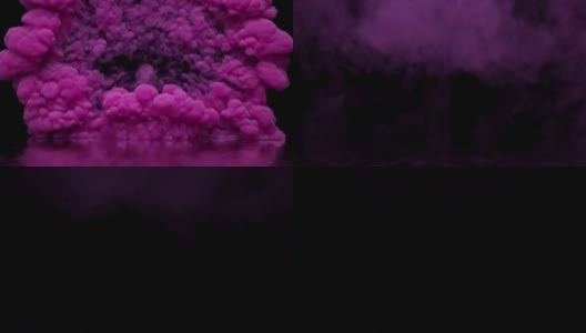 粉红色的烟，填补空白，雾，烟在黑色的背景，烟的气氛，五彩的粉末云高清在线视频素材下载