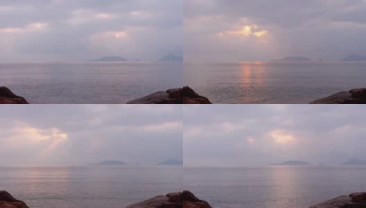 以中国浙江普陀山罗家岛为背景的海上日出镜头，4k视频。高清在线视频素材下载