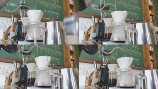 咖啡师在咖啡店制作过滤咖啡或煮咖啡高清在线视频素材下载