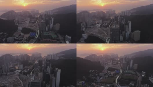 香港航拍v156在日落时飞越黄竹坑向香港仔方向高清在线视频素材下载