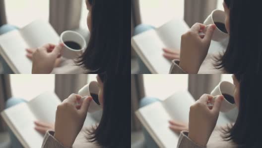 女人在家里放松的时候看书喝咖啡高清在线视频素材下载