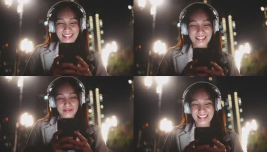 亚洲女性用智能手机听音乐高清在线视频素材下载