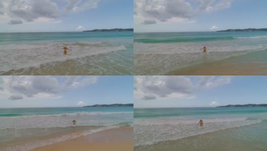 无忧无虑的年轻女子放松在异国情调的海滩。加勒比热带度假高清在线视频素材下载