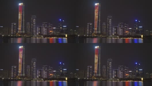 夜光时分，深圳城市公园湖泊映照出4k中国城市全景高清在线视频素材下载