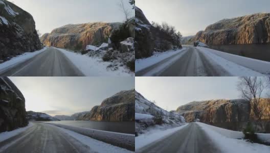 雪中行驶的POV汽车:挪威的群山高清在线视频素材下载