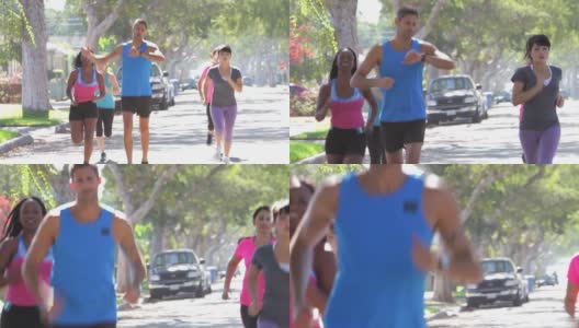 女性跑步训练师领导小组高清在线视频素材下载