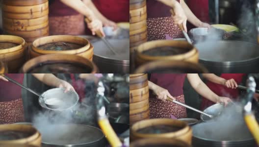 蒸点心，竹制托盘，不同层次的传统中国食物高清在线视频素材下载