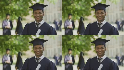 开朗的男毕业生向镜头展示证书，微笑着，成功了高清在线视频素材下载