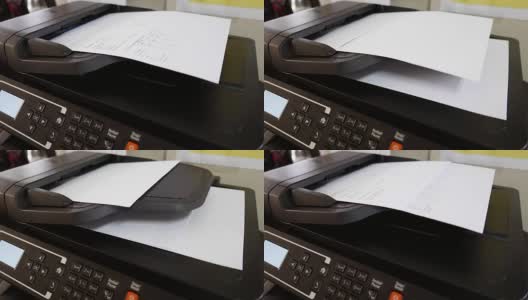 多功能打印机在工作场所使用。高清在线视频素材下载