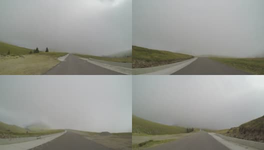 Pov美丽的乡村路线从汽车旅行通过雾的概念限速和安全驾驶与危险的交通条件高清在线视频素材下载