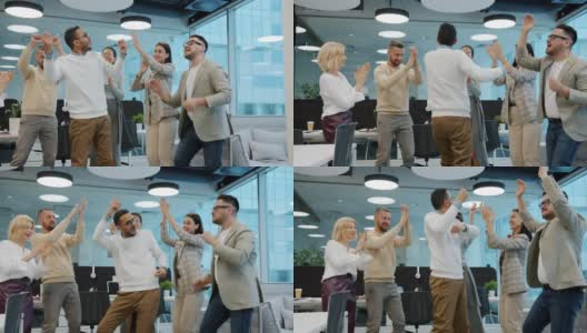 一名中东男子在公司活动上跳舞，同事们鼓掌高清在线视频素材下载