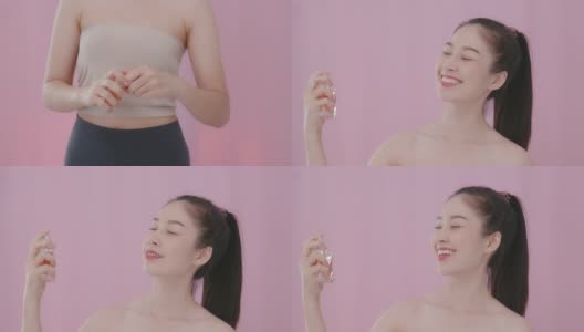 20-30岁的亚裔女性化妆和喷香水的肖像。在穿上粉红色的衣服去工作之前高清在线视频素材下载