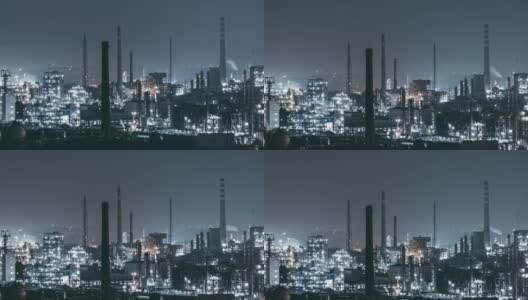 石化工厂和炼油厂T/L TU夜间鸟瞰图高清在线视频素材下载