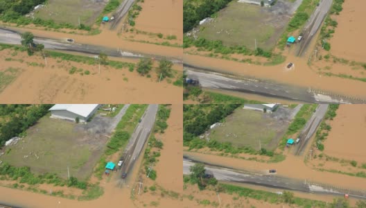 鸟瞰图的村庄和乡村道路淹没了汽车高清在线视频素材下载
