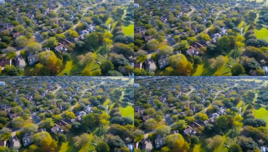 无人机俯瞰现代郊区通往城市住宅的弯曲道路高清在线视频素材下载