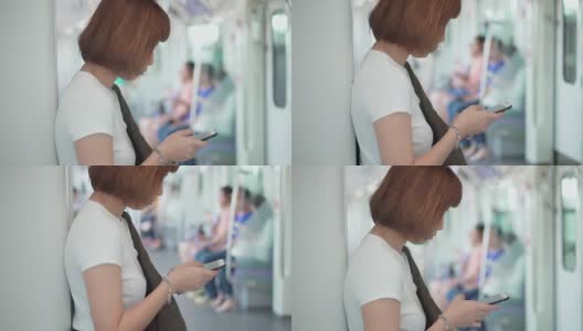 亚洲女性在火车上使用智能手机高清在线视频素材下载
