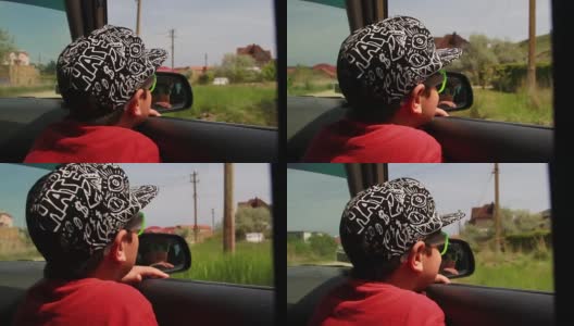 那个戴着帽子和眼镜的男孩从开着的车窗往里看高清在线视频素材下载