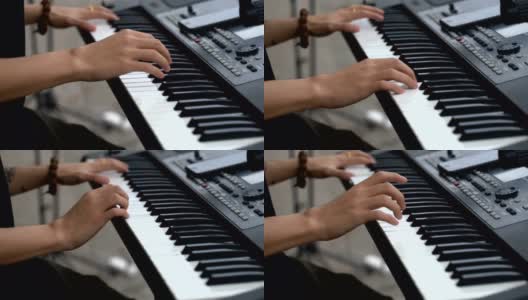 一个人练习乐器键盘高清在线视频素材下载