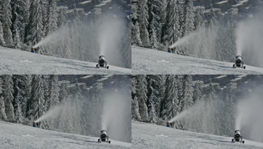 两个造雪机在滑雪坡上高清在线视频素材下载