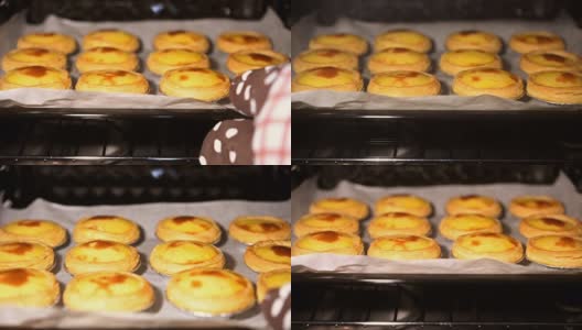从烤箱里拿出刚做好的蛋挞高清在线视频素材下载