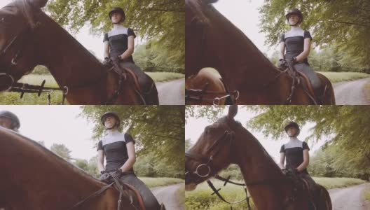 女骑马旅行与棕色马在一个繁茂的森林在明亮的天空高清在线视频素材下载