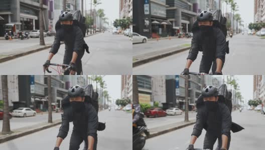 亚洲快递员骑着自行车高清在线视频素材下载