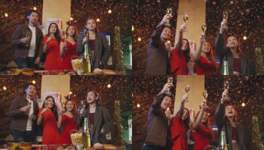一群朋友在晚上一起庆祝新年倒计时，用香槟酒碰杯高清在线视频素材下载