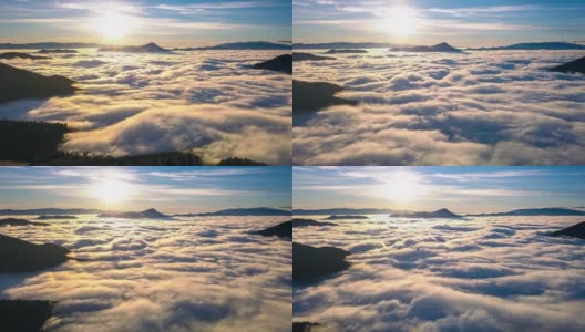 神奇的日出上面的雾云运动高山山谷自然在春天的早晨景观超时间推移高清在线视频素材下载