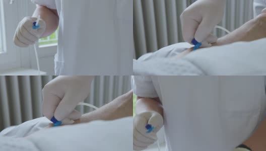 护士将静脉注射针插入病人的手上高清在线视频素材下载