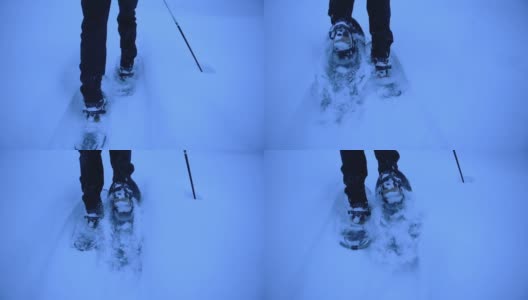 一名穿着双尖滑雪板、手持滑雪杖的游客在拉普兰的雪原上拖着脚。中枪高清在线视频素材下载