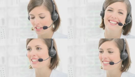 Smiling businesswoman with headset on高清在线视频素材下载