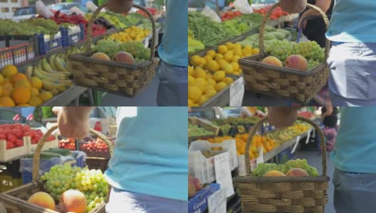 在水果市场上，挎着一篮葡萄和桃子的人高清在线视频素材下载