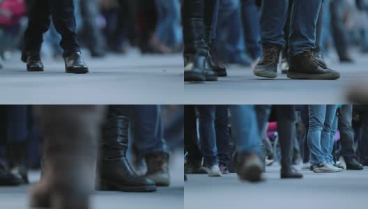 人群脚的特写，120帧/秒。人群的腿人们走在街上高清在线视频素材下载