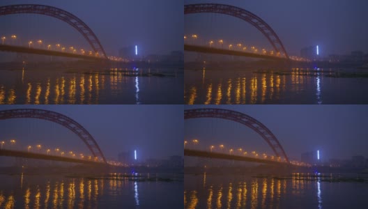 夜光照亮武汉市内著名的交通大桥，江边全景4k中国高清在线视频素材下载